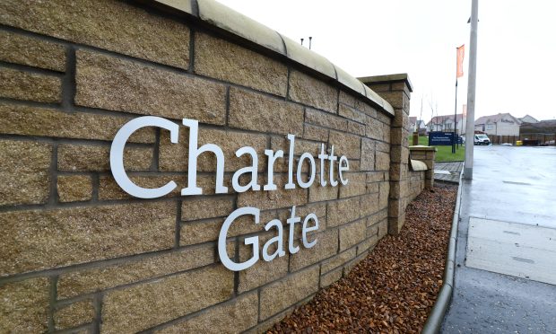 Entrance wall with Charlotte Gate sign