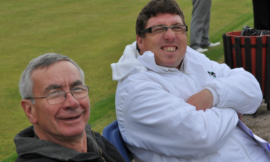 Craig, right, with Disability Sport Fife bowls team manager John Collins. Image: Supplied by Disability Sport Fife.