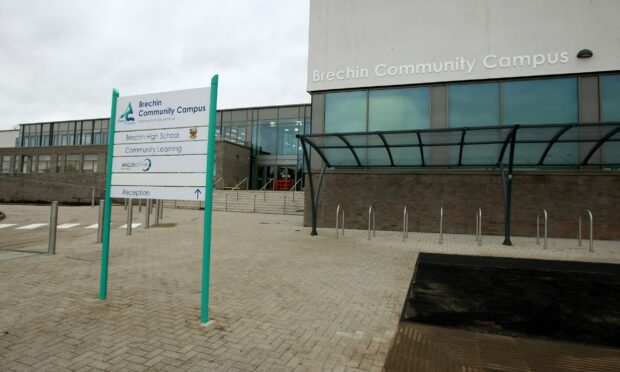 The pupils were seen smoking near the entrance to Brechin High School.