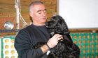 Simon Chapman with his Sprocker, Molly.