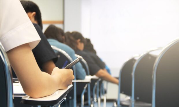 Stock image of children in a classroom.