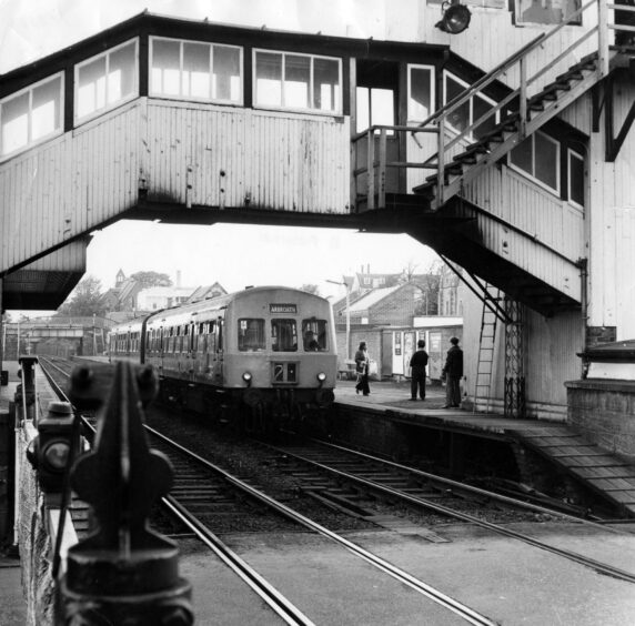 Broughty ferry railway station and a train.