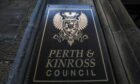 Perth and Kinross Council logo on wall of council HQ in Perth