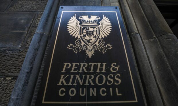 Perth and Kinross Council logo on wall of council HQ in Perth