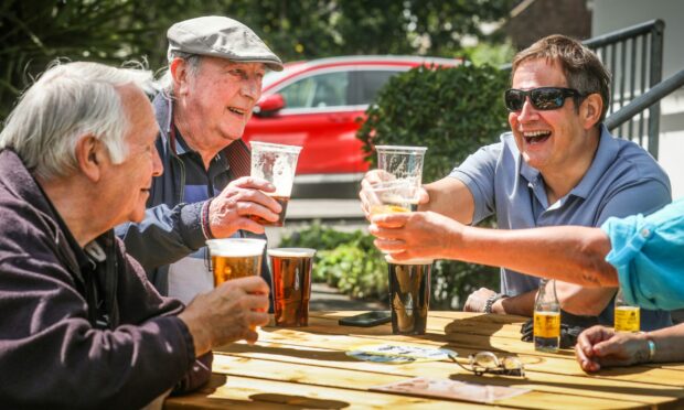 Angus locals enjoying a cold beer at The Aboukir Hotel, Carnoustie. Image: Mhairi Edwards/DCT Media.