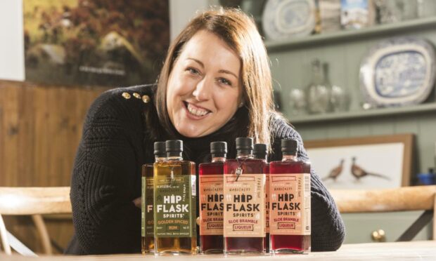 Angus entrepreneur Kim Cameron with her Hipflask Spirits range.