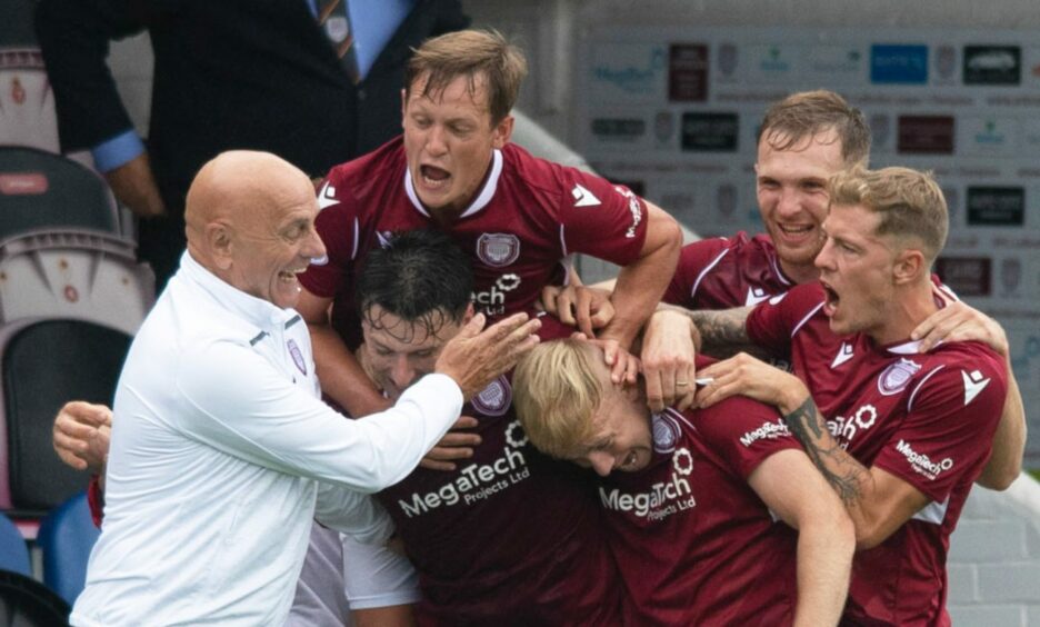 Arbroath celebrate one of their three goals against Partick Thistle last season. There has been little to celebrate this time round. Image: SNS