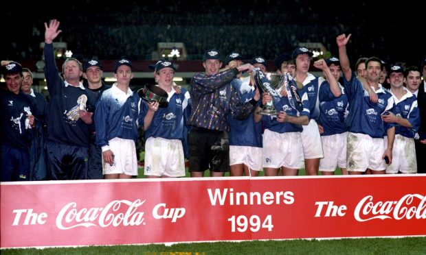 Raith Rovers with the Coca-Cola Cup after their stunning triumph over Celtic.