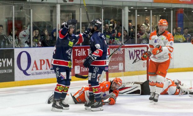 Dundee Stars and head coach Omar Pacha on the ice rink.