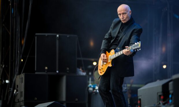 Midge Ure performing at a Rewind Festival in Scone, Perthshire
