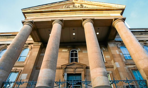 The trial is happening at Dundee Sheriff Court.