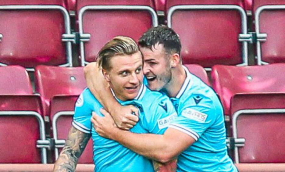 Jason Cummings and Danny Mullen celebrate at Tynecastle.