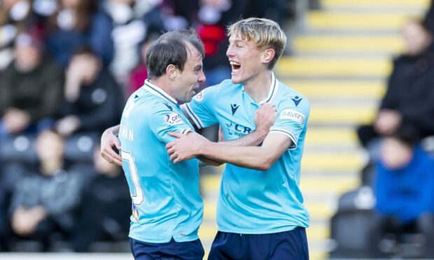 Dundee youngster Max Anderson celebrates his winner at St Mirren.