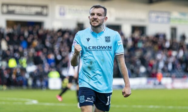 Paul McMullan celebrates after a win at St Mirren.