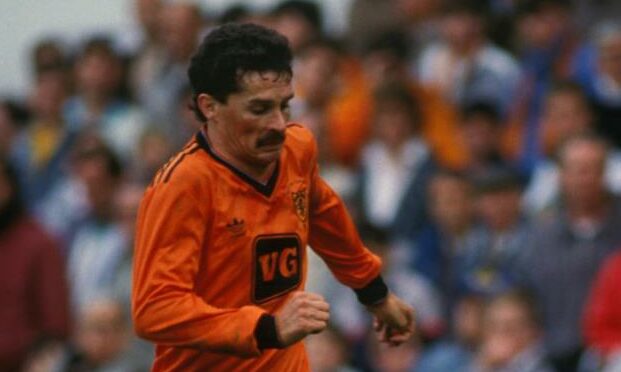 John Holt in action for Dundee United.