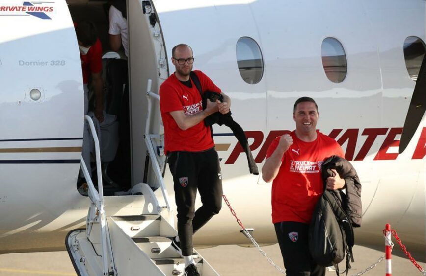 Fotheringham, right, after winning promotion with Ingolstadt