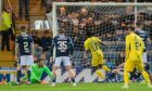 Regan Charles-Cook makes it 4-0 to Ross County.