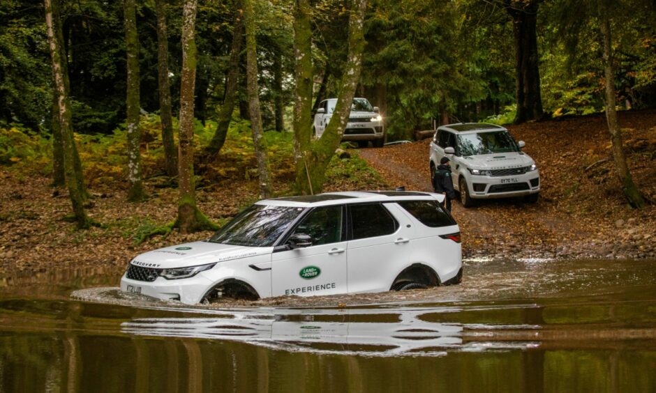 A vehicle at the Land Rover Experience Scotland entering water. Image: Steve MacDougall/DC Thomson.