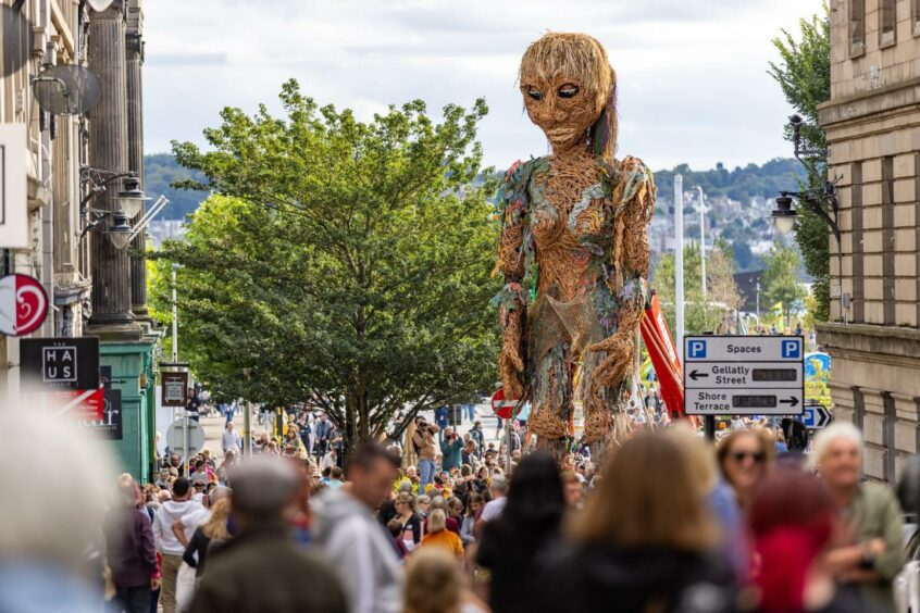 Storm, the puppet, paraded as part of COP26 in Dundee