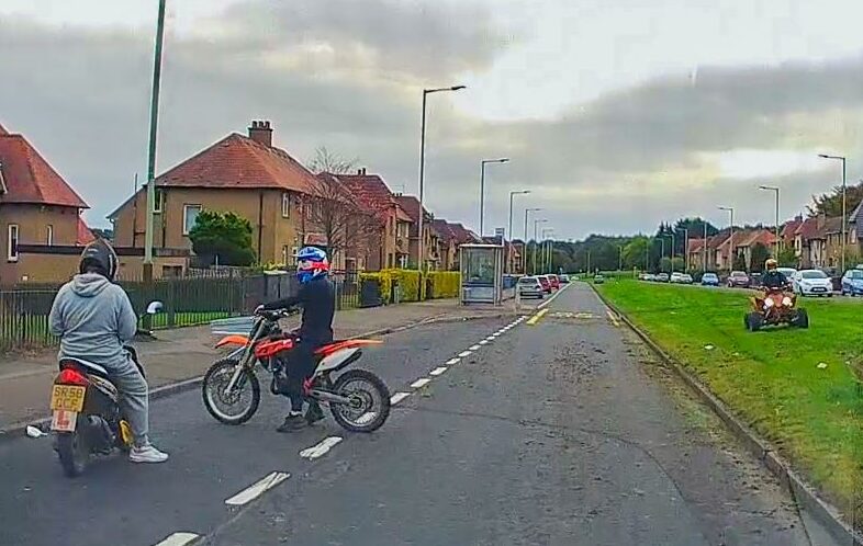 A still from dashcam footage of youngsters on illegal bikes in Kirkton, Dundee
