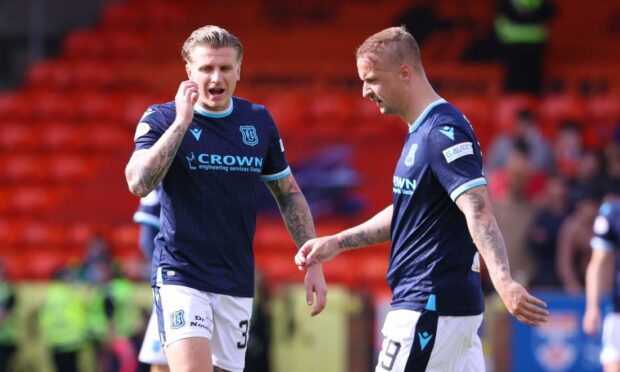 Dundee's Jason Cummings (left) in discussion with Leigh Griffiths.