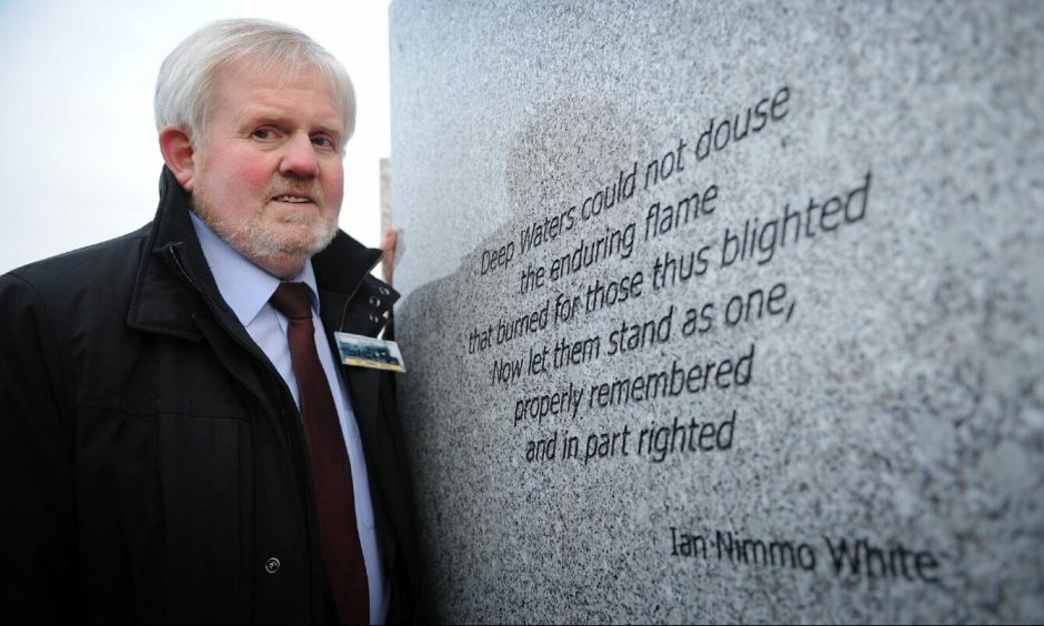 Ian Nimmo White in 2013 with the poem he wrote in memory of the Tay Bridge Disaster.