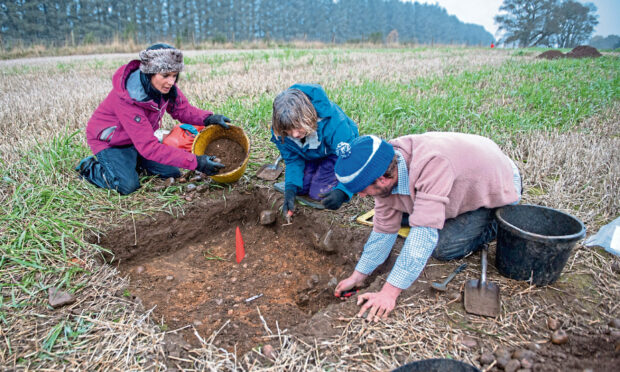 Gayle gets stuck into the dig with volunteers at Milton of Crathes. Picture: Kath Flannery.