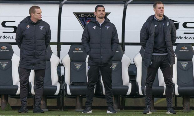 Dorrans, centre, in the dugout