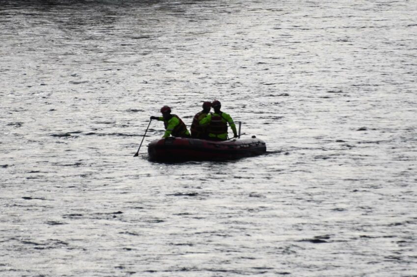 Fire service searching the Tay.