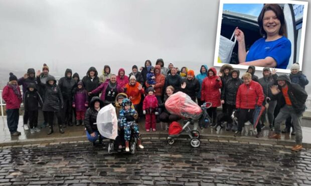 The group on completing their walk up Dundee Law in memory of Susan Millar (inset)