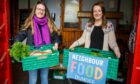 Gate Church Carbon Saving Project have introduced 'NeighbourFood Dundee'. Project co-ordinator, Lynsey Penny, (right) and Taylor Flynn with some of the food at the centre.