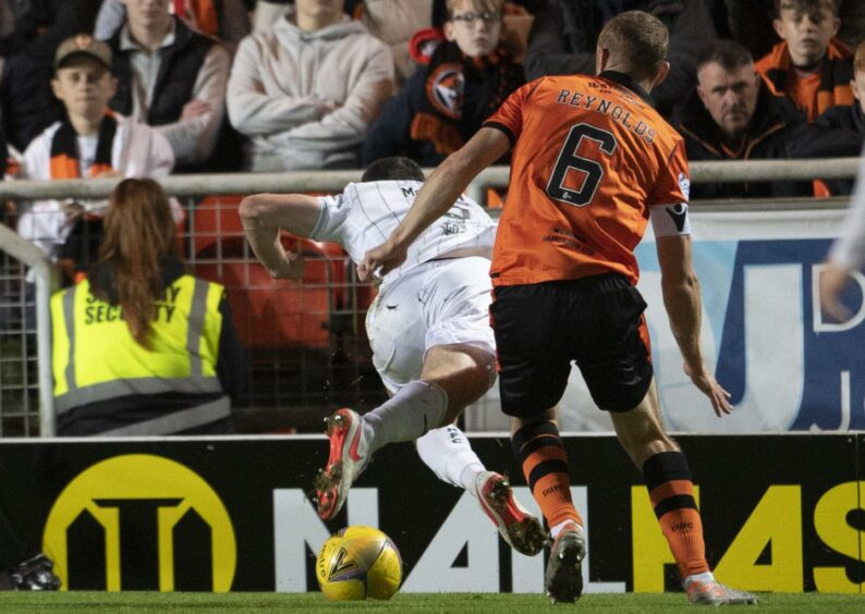 The controversial incident which saw Hibs awarded a penalty after Mark Reynolds was judged to have fouled Paul McGinn.