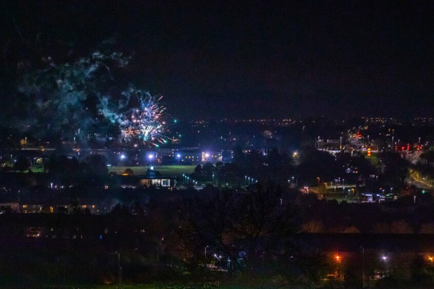 Fireworks going off above Dundee on Bonfire Night 2020.