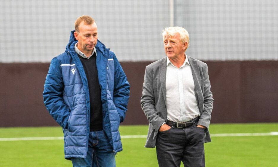 Dundee academy chief Stephen Wright and technical director Gordon Strachan walk on the pitch at the Regional Performance Centre. Image: Steve McDougall/DCT.