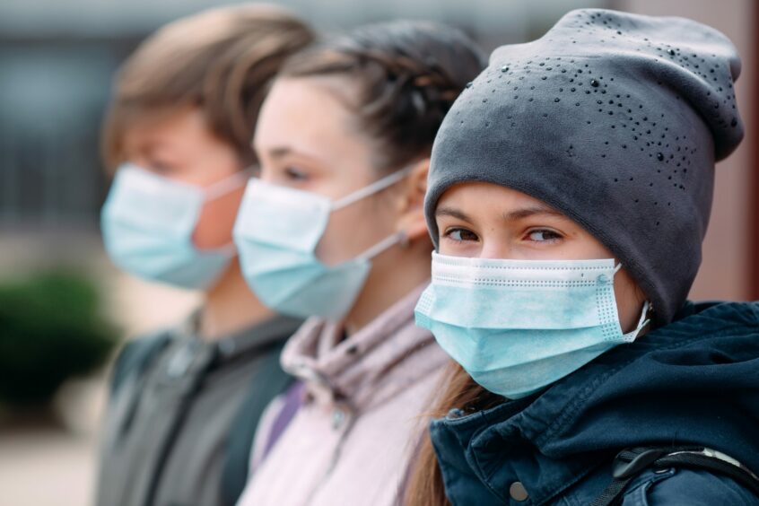 Youngsters in face masks