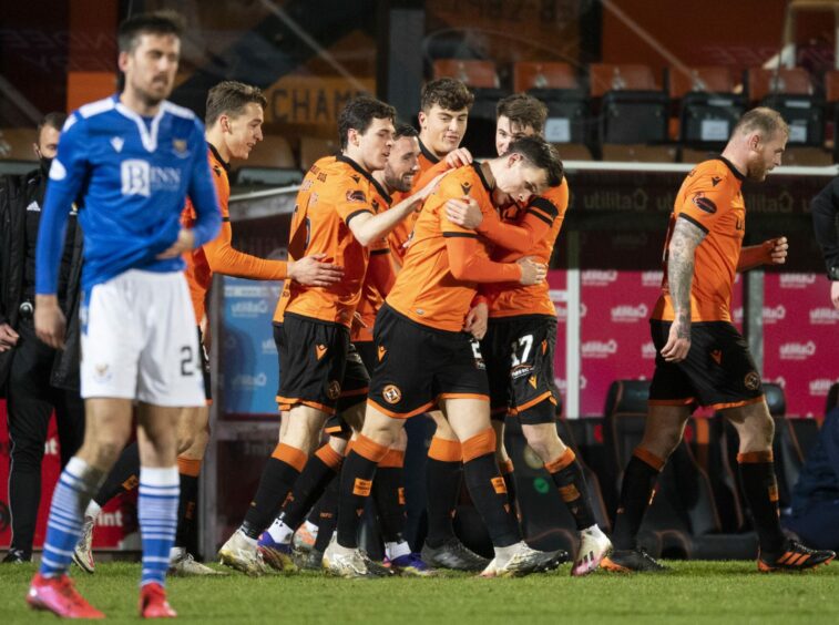 Dundee United's Lawrence Shankland (centre) celebrates making it 2-2 with a stunning 53-yard goal during the Scottish Premiership match between Dundee United and St Johnstone at Tannadice Park on January 12. Ross Parker/SNS Group.