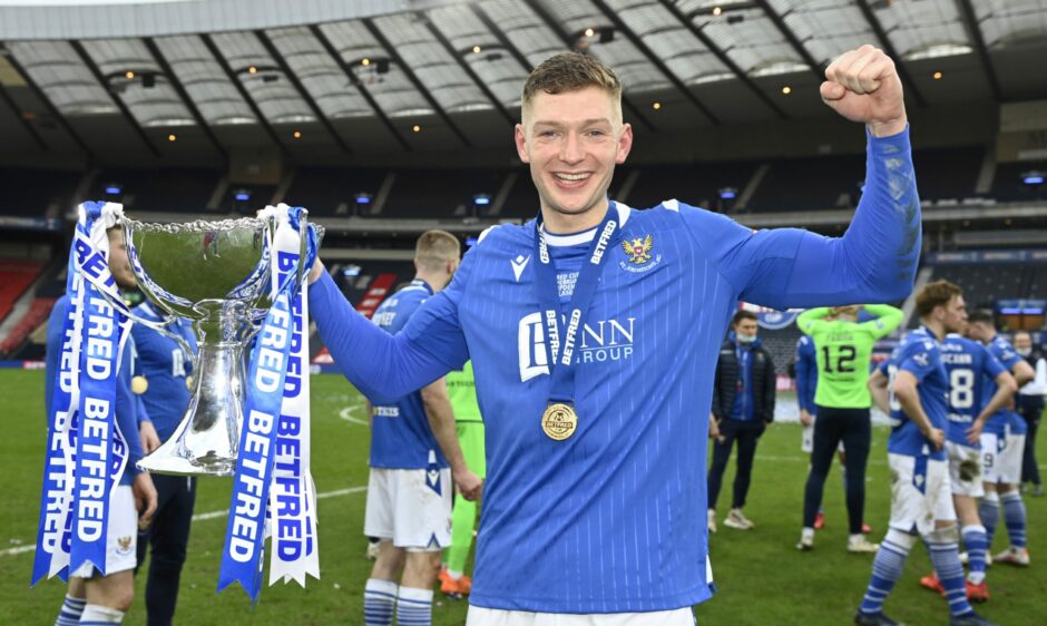 Success for St Johnstone came with not one but two cups this year. Liam Gordon celebrates with the Betfred Cup trophy during the Betfred Cup final between Livingston and St Johnstone at Hampden Stadium in Glasgow. Rob Casey / SNS Group.