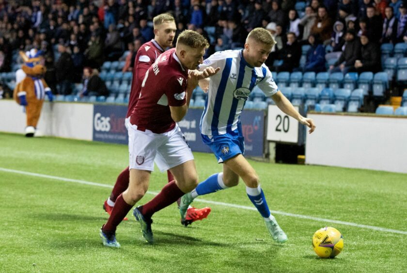 Arbroath's Jason Thomson closes down Kilmarnock's Fraser Murray in the recent Championship win at Rugby Park.