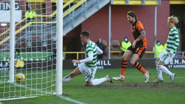 Charlie Mulgrew couldn't prevent David Turnbull from putting Celtic 2-0 up at Dundee United