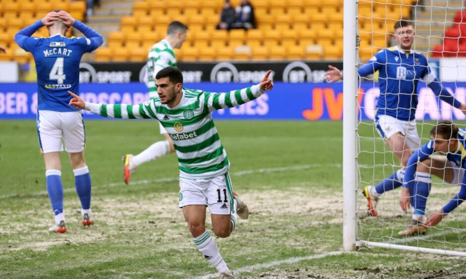 Celtic's Liel Abada wheels away after making it 1-0.
