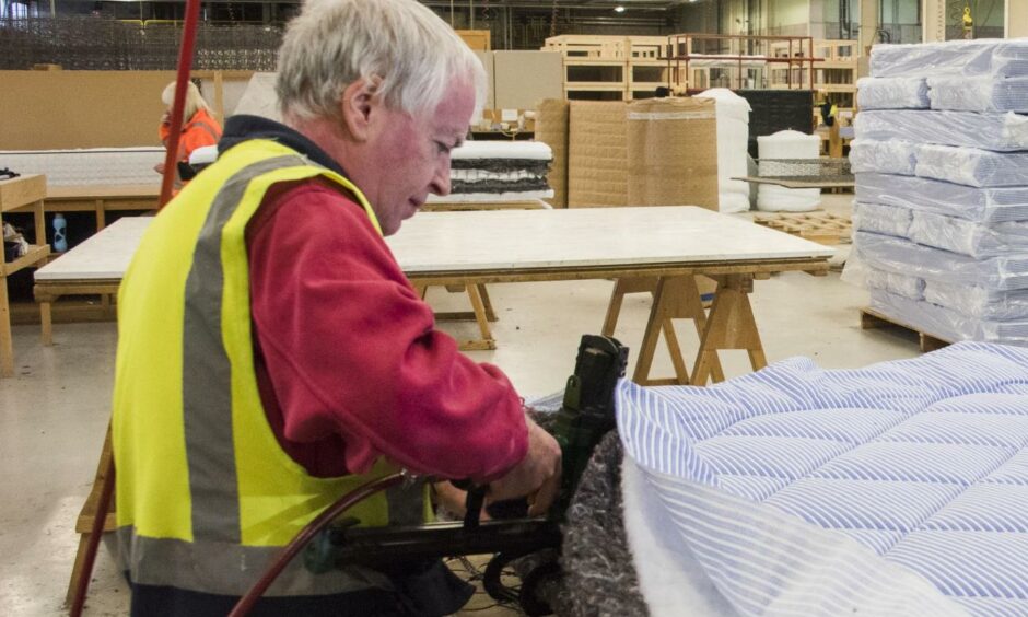 Derek McArtney makes both mattresses and furniture at Dovetail.