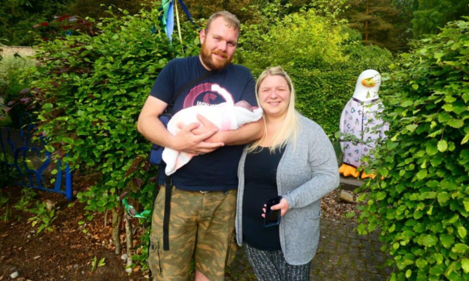 Andrew Couper and Gemma Munro with daughter Georgia.