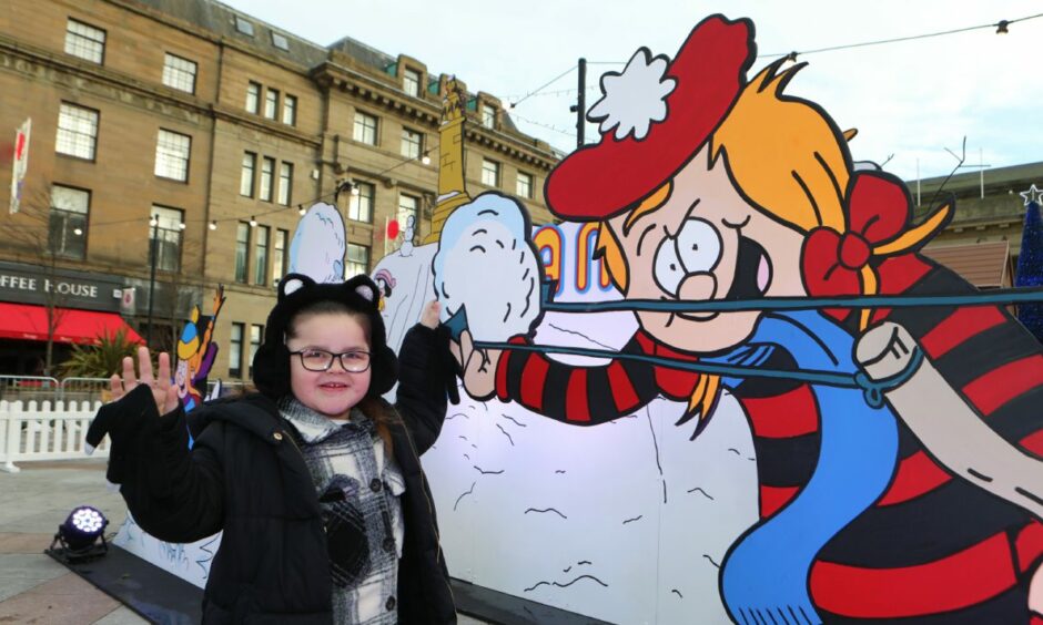 Six-year-old Ella Lynch from Dundee is all smiles at Dundee's Christmas activities.