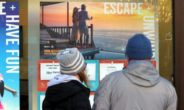 Shoppers browsing holiday deals in Dundee city centre this week.