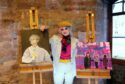 Ruby Davidson with two of her paintings at the Hospitalfield event. Pic: Gareth Jennings/DCT Media.