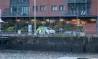 Officers appeared to be centred on Victoria Dock.