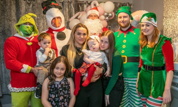 Kinsley (centre) enjoyed her festive visit with mum, Eden Kennedy, and (children from left) brother Freddie McMillan, cousins Abby Kennedy and Erin Kennedy.