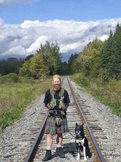 Perthshire man Michael and his dog Luna, who trekked across Canada.