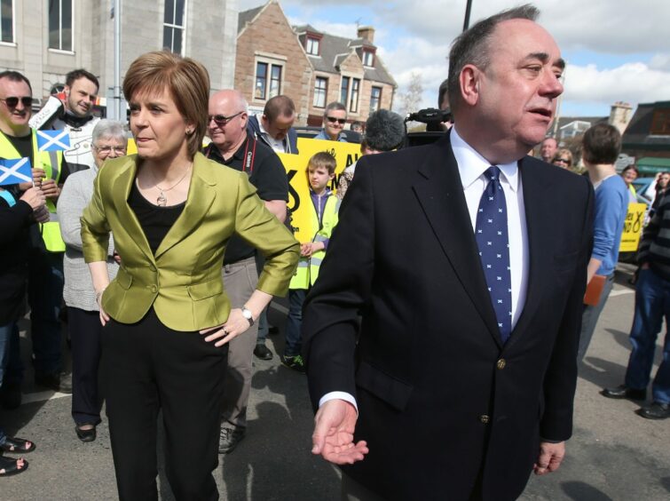 Nicola Sturgeon and Alex Salmond in a crowd of SNP supporters in Inverurie, Aberdeenshire, during campaigning for the 2015 General Election.