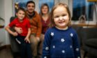 Isla, 5, with mum Laura, dad Andrew and big brother Leyton, 8. Picture Steven Brown/DCT Media.